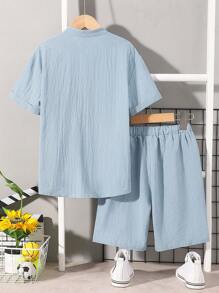 SHEIN Conjunto casual cómodo para niño preadolescente de camiseta de manga corta de unicolor y pantalones cortos