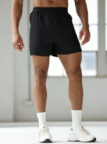 Manfinity Sport Corelite Boyfriend-Stil Herren Grafik Muster Elastische Taille Spalt Saum Sport Shorts, Sommer Schule