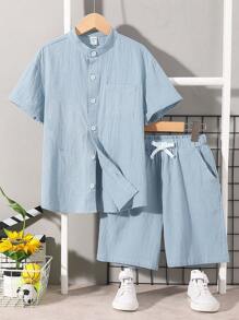 SHEIN Conjunto casual cómodo para niño preadolescente de camiseta de manga corta de unicolor y pantalones cortos