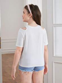 SHEIN Camiseta informal con cuello redondo para niña preadolescente de talla extendida con patrón de dibujos animados y huecos en la parte delantera