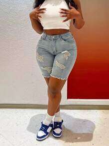 Shorts di jeans attillati strappati di moda da donna