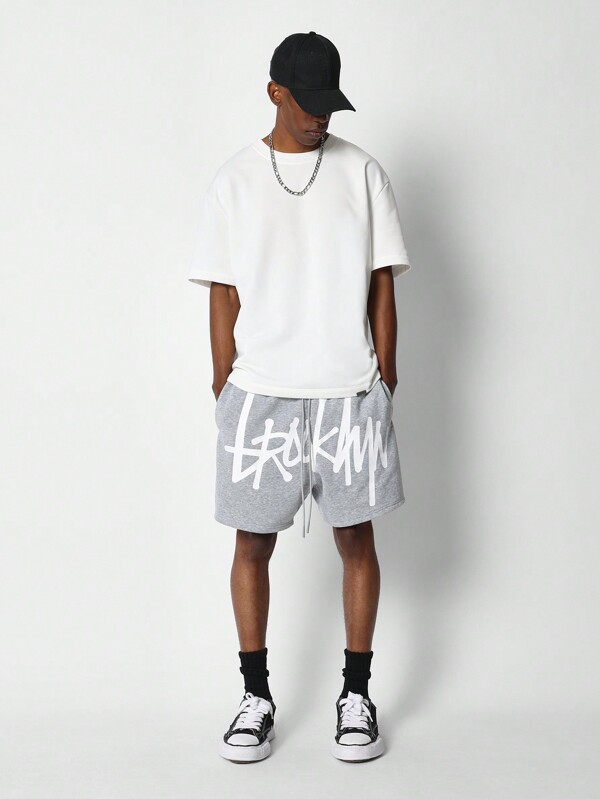 SUMWON Drop Crotch Short With Front Graphic Print