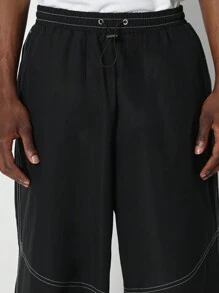 SUMWON Luźne, luźne spodnie spadochronowe z kontrastowymi szwami - Czarne - Zobacz 5