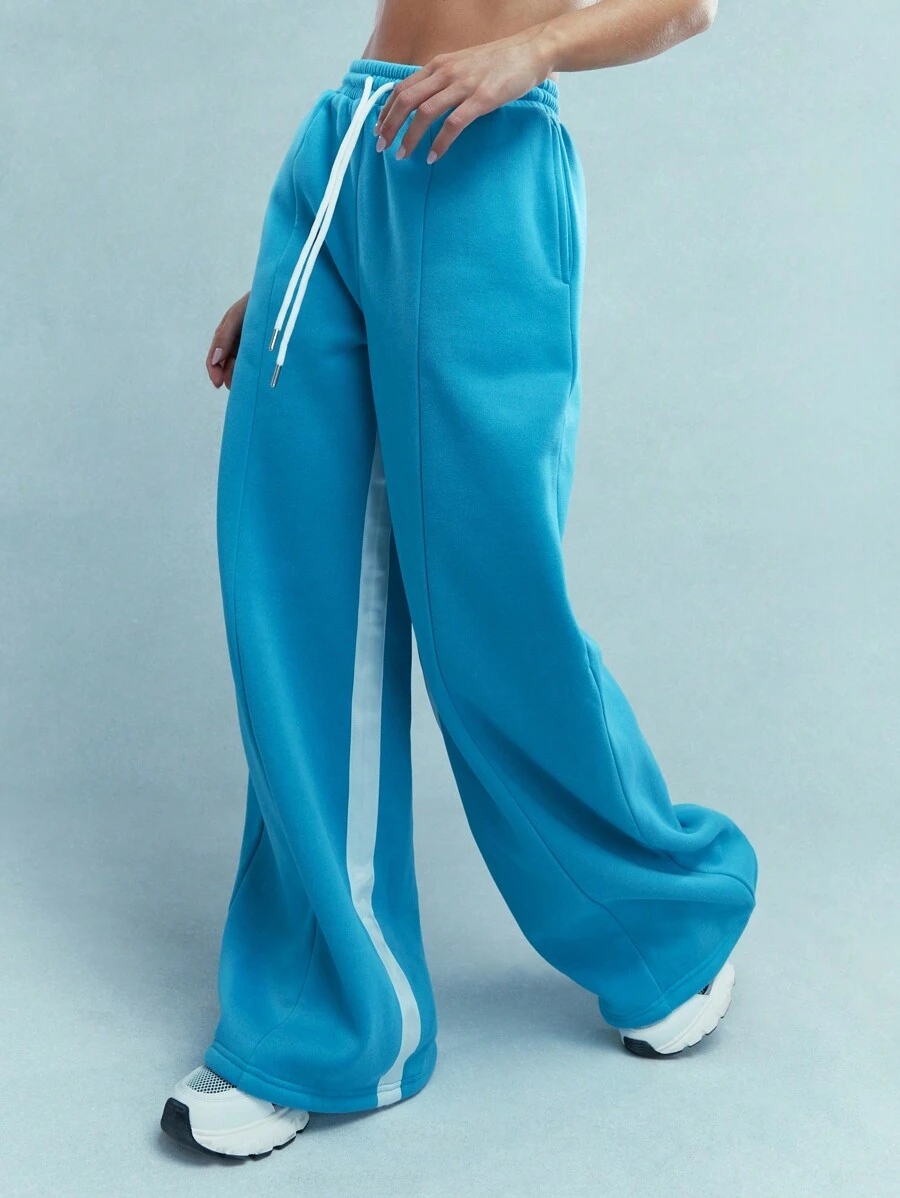 MISSGUIDED Quần nỉ ống rộng thêu logo màu khối phía sau có dây rút mặc mùa đông - Màu xanh bụi bặm - Xem 1