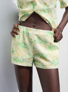 Maija 2-delige damesset met losse pasvorm, knop aan de voorkant, korte mouwen en broek met zak, zomer