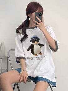 DAZY Camiseta casual de mujer de manga de hombro caído con estampado de dibujos animados de verano y parche con eslogan "Tengo un potencial ilimitado"