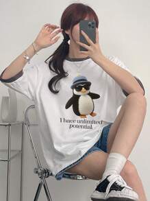 DAZY Camiseta casual de mujer de manga de hombro caído con estampado de dibujos animados de verano y parche con eslogan "Tengo un potencial ilimitado"
