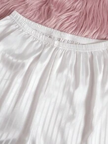 SHEIN Conjunto de pijama de 2 piezas con chaqueta de punto de manga corta a rayas y shorts para niñas