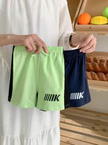 2pcs/Set Baby Boys' Spring/Summer Comfortable Sporty Casual Bottoms, Featuring Fluorescent Green & Navy Blue Patchwork Design