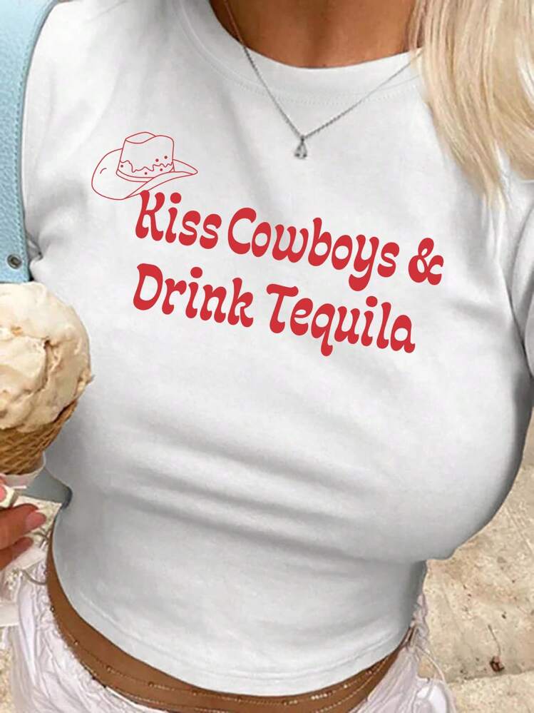 Flirla Camiseta corta de verano para mujer con eslogan rosa en estilo vaquero y western que dice "Besa a los vaqueros, bebe tequila"