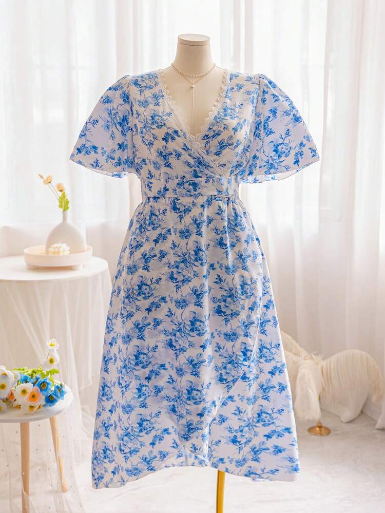 Plus Size Women's V-Neck Crisscross Bell Sleeve Top With Elastic Waist Asymmetrical Hem High-Low Shirt And Blue/White Floral Maxi Skirt Set For Vacation Style