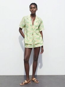Maija 2-delige damesset met losse pasvorm, knop aan de voorkant, korte mouwen en broek met zak, zomer