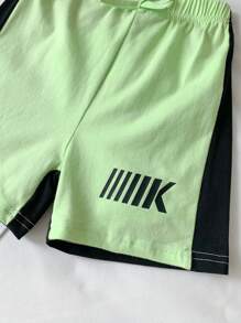 2pcs/Set Baby Boys' Spring/Summer Comfortable Sporty Casual Bottoms, Featuring Fluorescent Green & Navy Blue Patchwork Design
