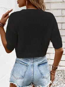 Ellegaria. New Short Sleeve Knitted Sweater With Round Neck For A Graceful Look - Black - View 2