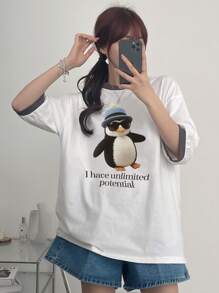 DAZY Camiseta casual de mujer de manga de hombro caído con estampado de dibujos animados de verano y parche con eslogan "Tengo un potencial ilimitado"