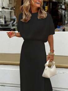 Ellegaria. New Short Sleeve Knitted Sweater With Round Neck For A Graceful Look - Black - View 1