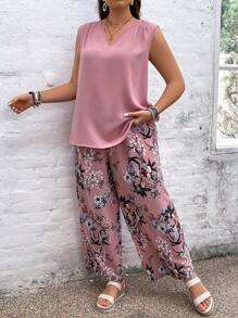SHEIN VCAY Conjunto de dos piezas en talla grande para vacaciones, compuesto por camisa de cuello en V con muesca en unicolor y pantalones anchos de pierna con estampado de flores