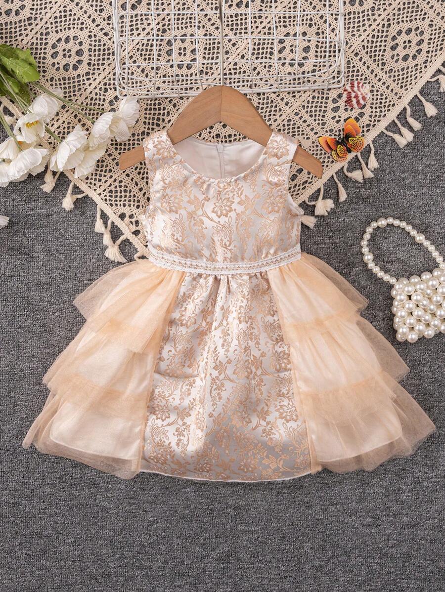 Vestido de verano sin mangas para bebé niña con Jacquard floral, cuello redondo, dobladillo de malla y parche de tela.