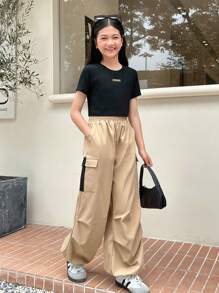SHEIN Tween Girl Casual Round Neck Letter Printed T-Shirt With Patchwork   Cargo Pants Two-Piece Set - Black - View 1