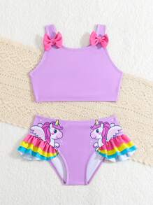 年轻女孩简单印花比基尼套装配蝴蝶结装饰夏日海滩