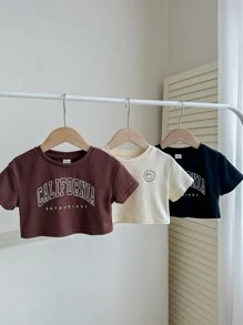 Bộ 3 áo thun ngắn tay thường ngày mùa hè cho bé gái có in chữ, bao gồm áo ngắn, áo vest trắng và quần short đen - Nhiều màu - Xem 6