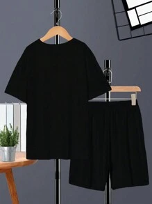 SHEIN Conjunto de camiseta de manga corta y pantalones cortos informal con diseño de oso de peluche genial y graffiti para niño preadolescente, niños grandes