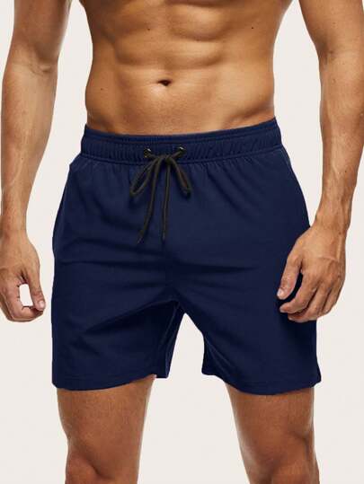 Manfinity KASUA Strängbyxor för män med vidbenta enfärgade strandshorts för semester