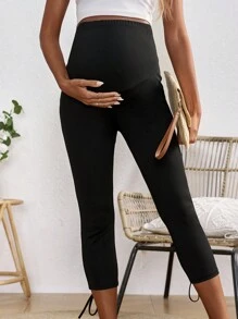 SHEIN Regulowane legginsy ciążowe w jednolitym kolorze z elastycznym paskiem