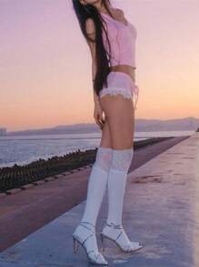 INAWLY Conjunto de 2 piezas para mujeres con top halter sin espalda de unicolor con pliegues y shorts con parches de encaje
