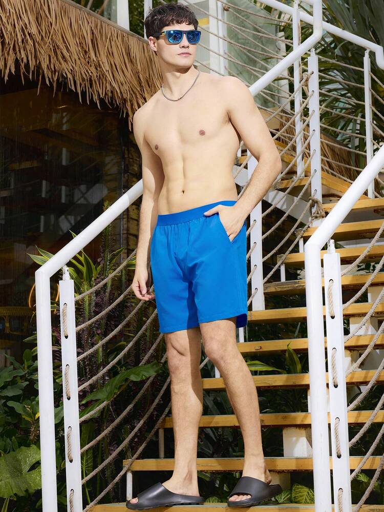 Men's Vacation Solid Color Loose Fit Beach Shorts With Pockets
