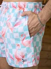 Manfinity Shorts de playa holgados para hombre con estampado de flamencos y cintura con cordón