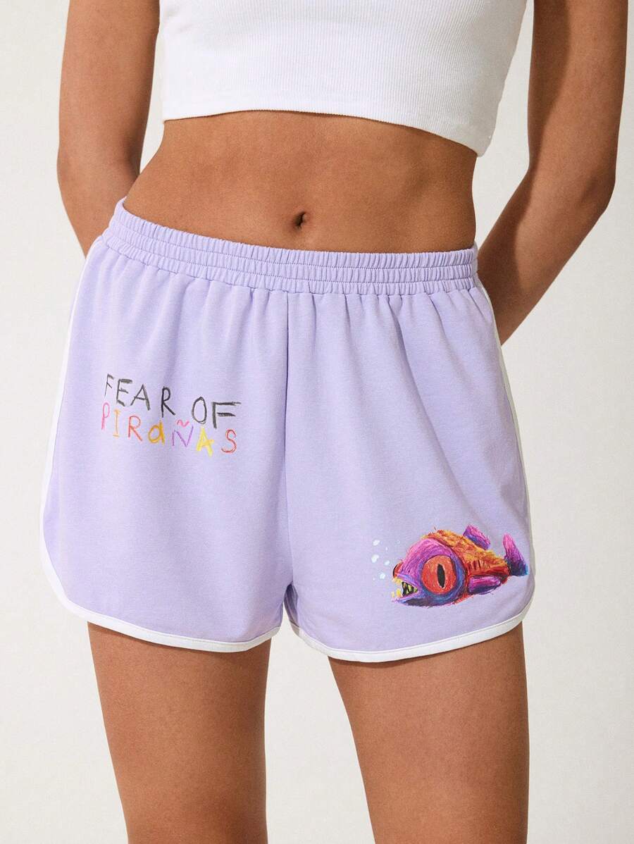 GAWX 艺术家弹性腰部夏季休闲短裤，带有字母和卡通图案，适合夏季、假日、度假、海滩、节日、伊比沙岛装扮、西方服饰 - 紫色 - 查看 1