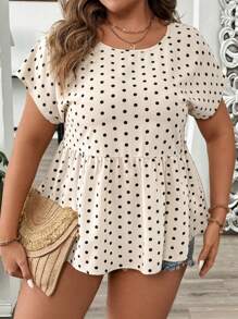 SHEIN LUNE Blouse pull col rond à pois grande taille avec volant à l'ourlet, décoration de bouton au dos et effet amincissant et couvrant. Pour l'été.