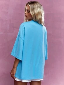MISSGUIDED تي شيرت قصير الأكتاف بطبعة شعار مطرزة للشارع بياقة طاقم واسع - الأزرق - مشاهدة 2