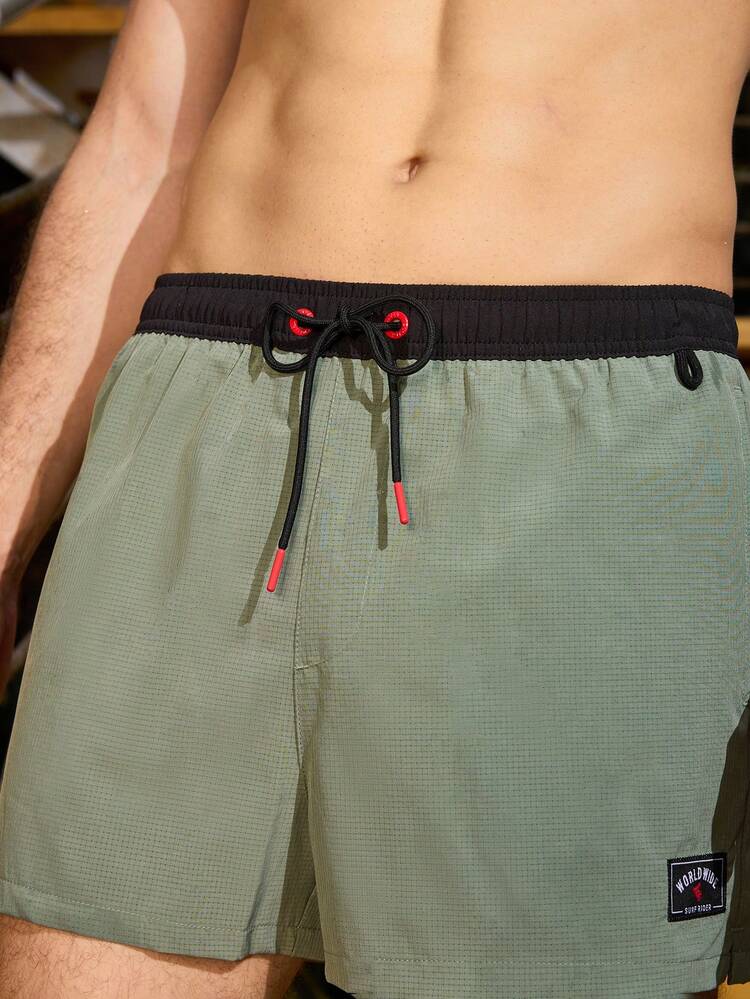 Men's Vacation Letter Printed Contrast Color Drawstring Waist Loose Beach Shorts