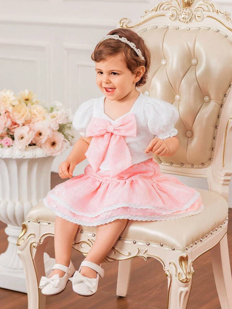 Baby Girl Cute Casual Bubble Short-Sleeved Top, Textured Flower Pattern, Color-Blocking Bowknot, Elastic Waist Sun-Skirt Set With Ruffle Trim