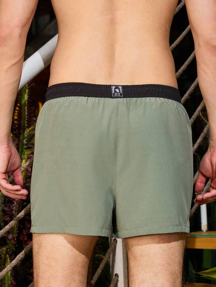 Men's Vacation Letter Printed Contrast Color Drawstring Waist Loose Beach Shorts