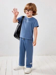 SHEIN Conjunto Casual De Camiseta De Manga Corta Y Pantalón Con Estampado De Letras Para Jóvenes