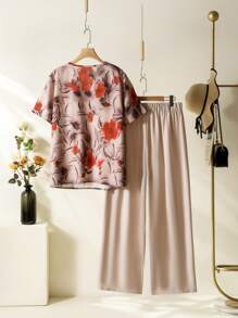 Lacomfia Plus Size Women's Random Printed Short Sleeve Top And Solid Color Pants Simple Daily Wear 2pcs Set, Retro Casual Vintage Fashion Loose Set Spring Summer