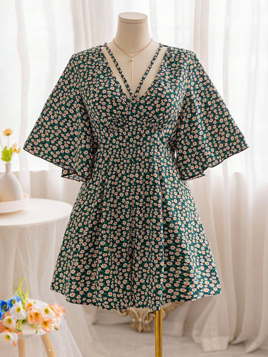 Soleia 大码波西米亚风女式花卉雏菊印花 V 领短袖连体衣，腰部收紧，非常适合夏季度假