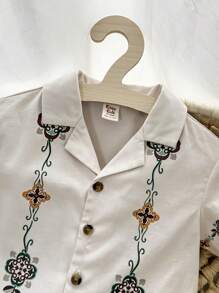 Cozy Pixies 嬰兒男孩休閒花紋短袖針織開衫，翻領款式