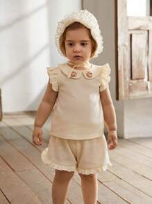 Cozy Pixies 嬰兒女童 彼得潘領短袖上衣和休閒短褲套裝，帶有花朵裝飾 - 杏色 - 查看 7