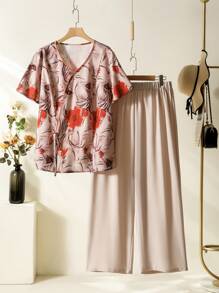 Lacomfia Plus Size Women's Random Printed Short Sleeve Top And Solid Color Pants Simple Daily Wear 2pcs Set, Retro Casual Vintage Fashion Loose Set Spring Summer