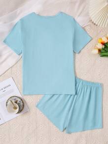 SHEIN Conjunto de ropa de hogar para mujer en dos piezas, color azul claro, con impresión de letras simples en pantalones cortos y camiseta de manga corta