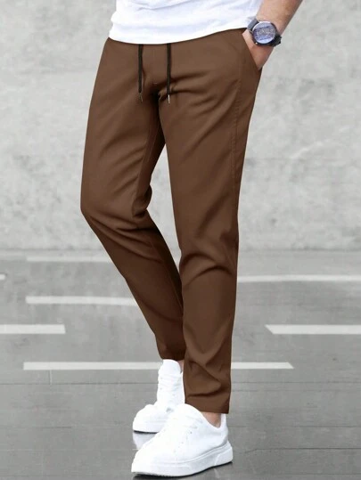 Manfinity Homme Pantaloni lunghi da uomo a gamba dritta, con coulisse in vita e tasche, per uso quotidiano, adatti per l'autunno