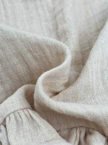 Cozy Pixies Conjunto de dos piezas en color albaricoque para bebé niña con top de tirantes de ganchillo con diseño de cintas de colores empalmado con pantalones cortos con dobladillo de volantes. Lindo diseño floral de yemas. Ideal para llevar en casa durante el verano o para vacaciones, estilo casual coreano y japonés.