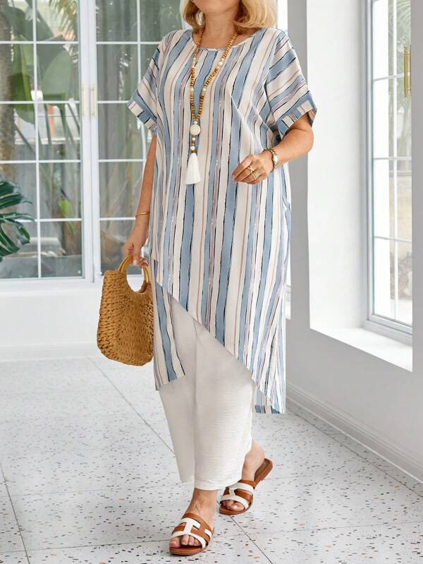 Conjunto de dos piezas de talla grande para vacaciones de verano, con camisa larga asimétrica con rayas en colisión y pantalones largos de unicolor