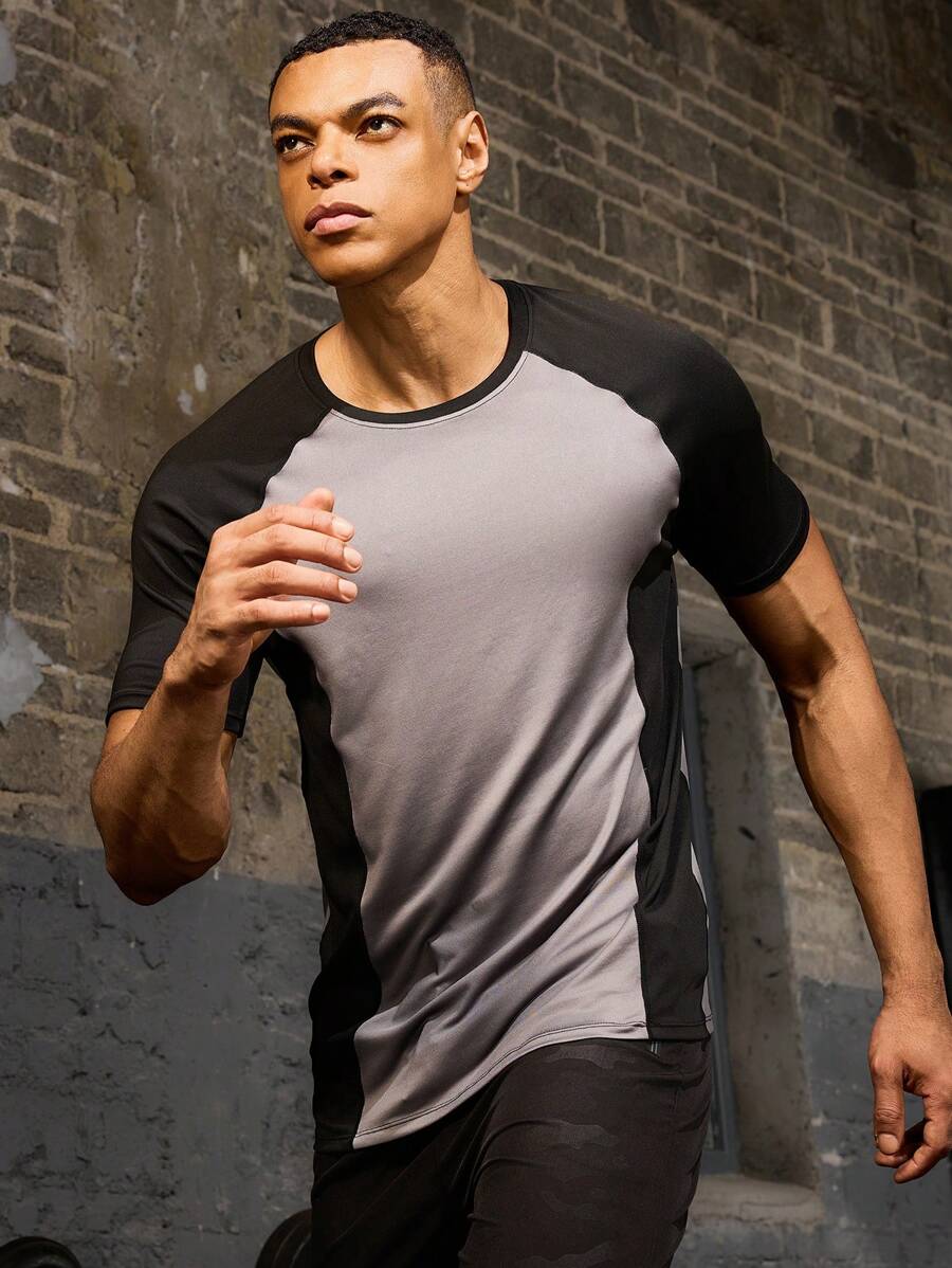 Manfinity Sport Corelite Maglietta sportiva casual da uomo stile boyfriend, con blocchi di colore e inserti, maglietta da compressione estiva da uomo - Multicolore - Visualizzare 1