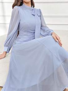 Modelyn فستان ماكسي أنيق بلون أحادي بياقة على شكل حرف V وربطة الخصر للنساء، فستان طويل للسهرة في فصل الخريف للنساء - الأزرق - مشاهدة 5