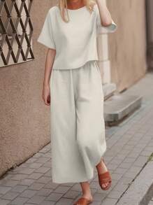 INAWLY Conjunto de dos piezas para mujer: top de manga corta y cuello redondo de unicolor, y pantalones - Albaricoque - Ver 1